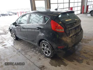 2011 Ford Fiesta SES with VIN 3FADP4FJ7BM196559, listed as a IAAI auction lot 41527976 with 65,861 mi miles. Bid and sale history available at carsss.com. Image 3.