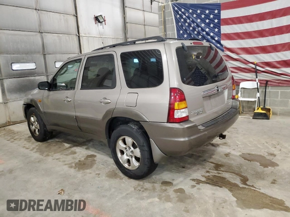 2001 Mazda Tribute LX with VIN 4F2CU08101KM05943, listed as a Copart auction lot 84077694 with 137,937 mi miles and Salvage Title. Bid and sale history available at DreamBid. Image 2.