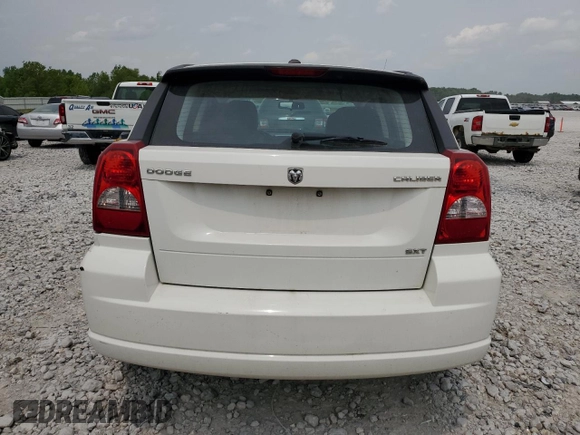 2009 Dodge Caliber SXT z VIN 1B3HB48A89D198108, wystawiony jako Copart lot #58910415 z przebiegiem 176 257 mil mil oraz Czysty tytuł • Clean title. Historia ofert i sprzedaży dostępna na DreamBid. Obrazek 6.