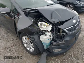 2013 Kia Rio EX with VIN KNADN4A34D6285952, listed as a IAAI auction lot 42036441 with 153,462 mi miles and . Bid and sale history available at DreamBid. Image 6.