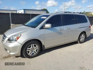 2006 Honda Odyssey EX-L with VIN 5FNRL38786B430256, listed as a Copart auction lot 60032405 with 178,808 mi miles and Salvage title. Bid and sale history available at DreamBid. Image 1.