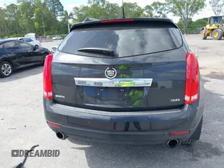 2013 Cadillac SRX Performance Collection z VIN 3GYFNDE39DS543037, wystawiony jako IAAI lot #42162276 z przebiegiem 156 282 mil mil oraz . Historia ofert i sprzedaży dostępna na DreamBid. Obrazek 16.