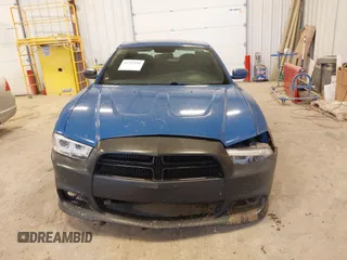 2014 Dodge Charger Police with VIN 2C3CDXAT5EH218901, listed as a IAAI auction lot 41723531 with 216,643 mi miles. Bid and sale history available at carsss.com. Image 12.