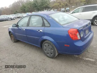 2006 Suzuki Forenza z VIN KL5JD56ZX6K372427, wystawiony jako Copart lot #80627544 z przebiegiem 94 493 mil mil oraz Tytuł czysty. Historia ofert i sprzedaży dostępna na DreamBid. Obrazek 2.