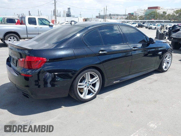 2015 BMW 5 Series 550i with VIN WBAKN9C5XFD961631, listed as a IAAI auction lot 42248127 with 30,821 mi miles and . Bid and sale history available at DreamBid. Image 4.