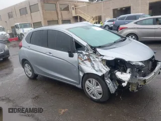 2019 Honda Fit LX z VIN 3HGGK5H43KM720956, wystawiony jako IAAI lot #40942867 z przebiegiem 37 620 mil mil oraz . Historia ofert i sprzedaży dostępna na DreamBid. Obrazek 1.