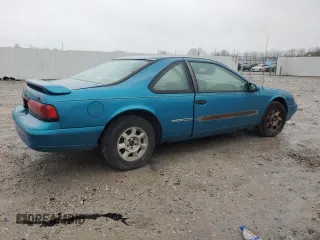 1994 Ford Thunderbird LX with VIN 1FALP6243RH223519, listed as a Copart auction lot 80962814 with 125,016 mi miles and Salvage Title. Bid and sale history available at DreamBid. Image 3.