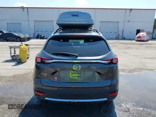 2022 Mazda CX-9 Grand Touring with VIN JM3TCBDY4N0618680, listed as a IAAI auction lot 40086806 with 34,142 mi miles and . Bid and sale history available at DreamBid. Image 16.