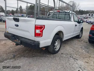 2019 Ford F-150 XL with VIN 1FTMF1CB1KKC54875, listed as a IAAI auction lot 41526335 with 148,810 mi miles. Bid and sale history available at carsss.com. Image 4.