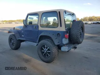 2001 Jeep Wrangler Sport with VIN 1J4FA49S21P346900, listed as a Copart auction lot 75439604 with 128,824 mi miles and Clean Title. Bid and sale history available at carsss.com. Image 2.