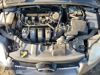 2013 Ford Focus SE z VIN 1FADP3F22DL233878, wystawiony jako Copart lot #52598475 z przebiegiem 131 539 mil mil oraz Szkoda całkowita • Salvage title. Historia ofert i sprzedaży dostępna na DreamBid. Obrazek 11.