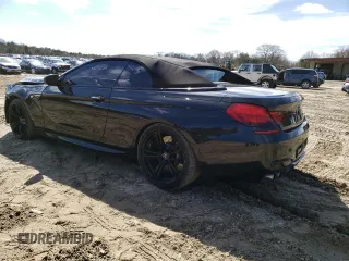 2018 BMW M6 z VIN WBS6G9C50JD950282, wystawiony jako Copart lot #46023174 z przebiegiem 14 184 mil mil oraz . Historia ofert i sprzedaży dostępna na DreamBid. Obrazek 2.