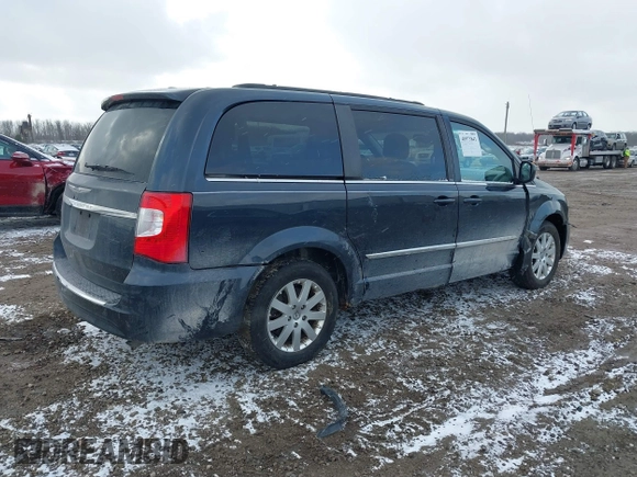 2013 Chrysler Town & Country Touring with VIN 2C4RC1BGXDR613852, listed as a IAAI auction lot 40973841 with 150,234 mi miles. Bid and sale history available at carsss.com. Image 4.