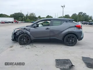 2021 Toyota C-HR LE with VIN JTNKHMBX3M1120177, listed as a IAAI auction lot 41257866 with 43,964 mi miles. Bid and sale history available at carsss.com. Image 14.