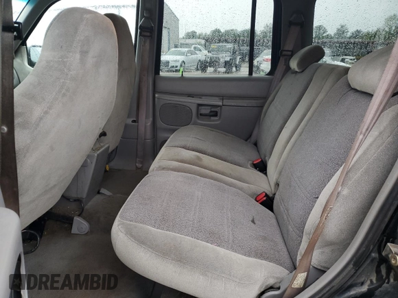 2000 Ford Explorer XLS z VIN 1FMZU62XXYZB33375, wystawiony jako Copart lot #69896614 z przebiegiem 281 805 mil mil oraz Szkoda całkowita • Salvage title. Historia ofert i sprzedaży dostępna na DreamBid. Obrazek 11.