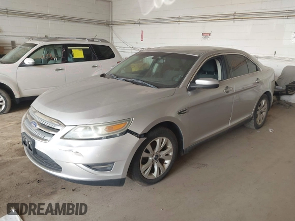 2011 Ford Taurus SEL with VIN 1FAHP2EW6BG170287, listed as a IAAI auction lot 42191702 with 199,477 mi miles. Bid and sale history available at carsss.com. Image 2.
