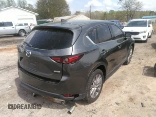 2019 Mazda CX-5 Grand Touring with VIN JM3KFBDM7K0606860, listed as a IAAI auction lot 41936338 with 93,057 mi miles. Bid and sale history available at carsss.com. Image 4.