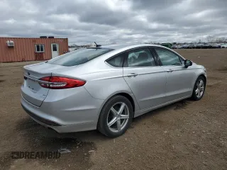 2018 Ford Fusion SE с VIN 3FA6P0HDXJR130582, выставлен на аукционе Copart как лот 53169815 с пробегом 137 512 миль миль и Списание • Salvage title. История ставок и продаж доступна на DreamBid. Изображение 3.