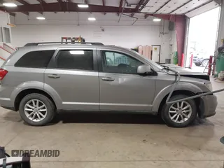 2016 Dodge Journey SXT with VIN 3C4PDCBG0GT198686, listed as a IAAI auction lot 41561007 with 85,289 mi miles. Bid and sale history available at carsss.com. Image 12.