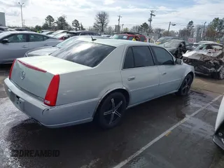 2006 Cadillac DTS w/1SC with VIN 1G6KD57Y56U101903, listed as a IAAI auction lot 41710160 with 151,057 mi miles. Bid and sale history available at carsss.com. Image 4.