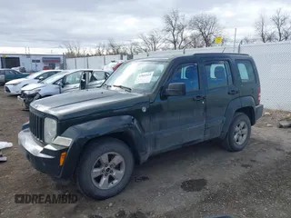 2012 Jeep Liberty Sport with VIN 1C4PJMAK8CW104272, listed as a IAAI auction lot 41841519 with 163,979 mi miles. Bid and sale history available at carsss.com. Image 2.