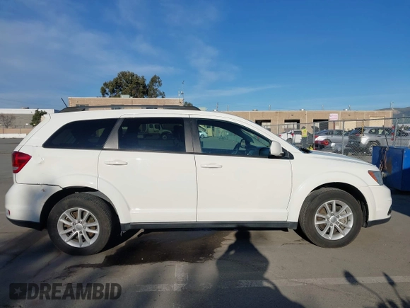 2015 Dodge Journey SXT with VIN 3C4PDCBG8FT673824, listed as a IAAI auction lot 41603661 with 169,939 mi miles and . Bid and sale history available at DreamBid. Image 13.