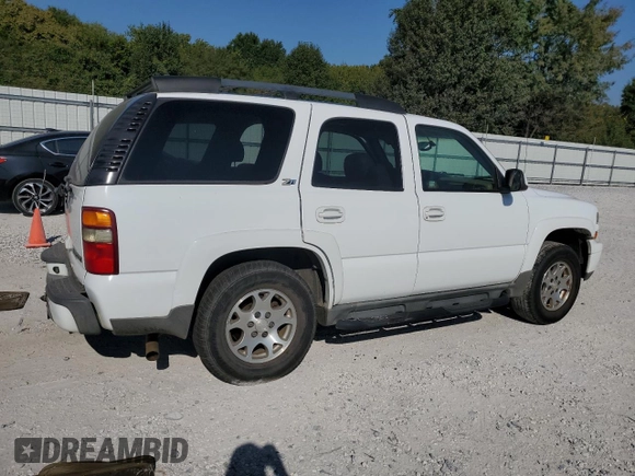 2003 Chevrolet Tahoe Z71 with VIN 1GNEK13Z23R205780, listed as a Copart auction lot 71045034 with 294,759 mi miles and Salvage Title. Bid and sale history available at carsss.com. Image 3.