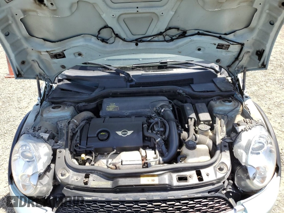 2013 MINI Convertible S z VIN WMWZP3C54DT551321, wystawiony jako Copart lot #57089205 z przebiegiem 92 441 mil mil oraz Szkoda całkowita • Salvage title. Historia ofert i sprzedaży dostępna na DreamBid. Obrazek 11.