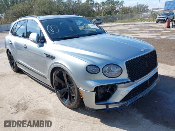 2022 Bentley Bentayga V8 z VIN SJAAM2ZV9NC011752, wystawiony jako IAAI lot #41265000 z przebiegiem Nie podano mil oraz . Historia ofert i sprzedaży dostępna na DreamBid. Obrazek 6.