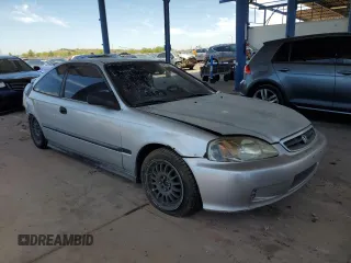 1999 Honda Civic DX with VIN 1HGEJ6125XL086017, listed as a Copart auction lot 58728564 with 262,100 mi miles and Salvage Title. Bid and sale history available at carsss.com. Image 4.