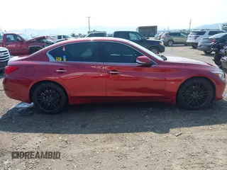 2015 Infiniti Q50 z VIN JN1BV7AR3FM419724, wystawiony jako IAAI lot #40104971 z przebiegiem 56 736 mil mil oraz . Historia ofert i sprzedaży dostępna na DreamBid. Obrazek 13.