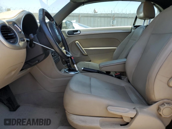 2014 Volkswagen Beetle 1.8T with VIN 3VW517AT9EM820812, listed as a Copart auction lot 61730685 with 85,571 mi miles and Clean title. Bid and sale history available at DreamBid. Image 7.