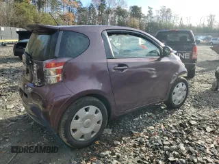 2013 Scion iQ with VIN JTNJJXB00DJ022017, listed as a Copart auction lot 82717994 with Not provided miles and Salvage title. Bid and sale history available at DreamBid. Image 3.