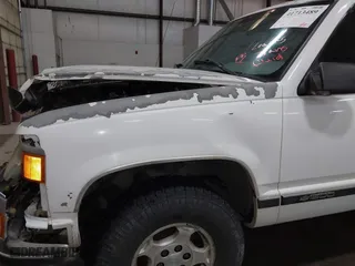 1996 Chevrolet Tahoe with VIN 1GNEK13R5TJ341299, listed as a IAAI auction lot 41713489 with 251,990 mi miles. Bid and sale history available at carsss.com. Image 18.
