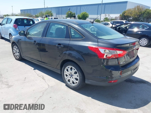 2012 Ford Focus SE with VIN 1FAHP3F24CL471005, listed as a IAAI auction lot 42726292 with 162,750 mi miles and . Bid and sale history available at DreamBid. Image 3.