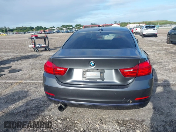 2014 BMW 4 Series 428i xDrive with VIN WBA3N5C57EK196790, listed as a IAAI auction lot 40571670 with 108,114 mi miles and . Bid and sale history available at DreamBid. Image 16.