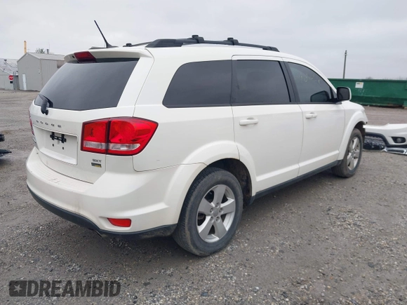 2012 Dodge Journey SXT with VIN 3C4PDCCG6CT132457, listed as a IAAI auction lot 41907657 with 169,160 mi miles and . Bid and sale history available at DreamBid. Image 4.
