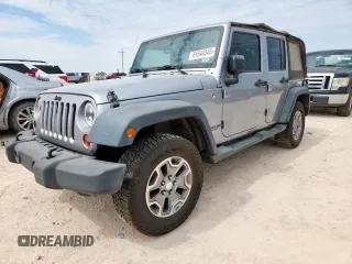2013 Jeep Wrangler Unlimited Sport z VIN 1C4BJWDG4DL630009, wystawiony jako Copart lot #61544545 z przebiegiem 126 870 mil mil oraz Czysty tytuł • Clean title. Historia ofert i sprzedaży dostępna na DreamBid. Obrazek 1.