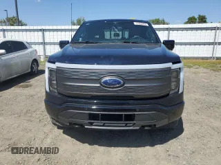 2023 Ford F-150 Lightning Pro with VIN 1FT6W1EV0PWG28960, listed as a Copart auction lot 51858855 with Not Provided miles and Non Repairable. Bid and sale history available at DreamBid. Image 5.