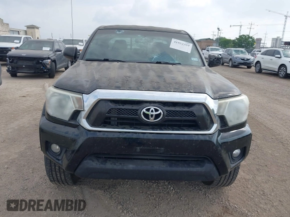 2014 Toyota Tacoma PreRunner with VIN 3TMJU4GN9EM157662, listed as a IAAI auction lot 41952359 with 109,002 mi miles and . Bid and sale history available at DreamBid. Image 12.