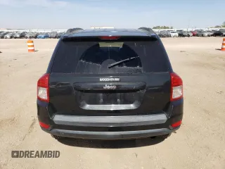 2011 Jeep Compass with VIN 1J4NT1FA4BD159872, listed as a Copart auction lot 74118834 with 142,660 mi miles and Salvage Title. Bid and sale history available at carsss.com. Image 6.