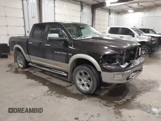 2011 Ram 1500 Laramie with VIN 1D7RV1CT7BS601374, listed as a IAAI auction lot 41598044 with 238,624 mi miles and . Bid and sale history available at DreamBid. Image 1.