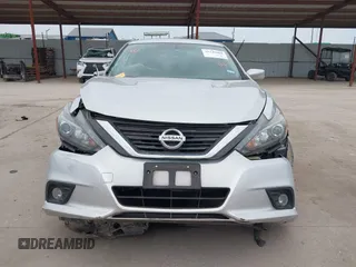 2016 Nissan Altima SL z VIN 1N4BL3APXGC281512, wystawiony jako IAAI lot #41245604 z przebiegiem 123 193 mil mil oraz . Historia ofert i sprzedaży dostępna na DreamBid. Obrazek 12.