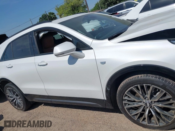 2024 Cadillac XT4 FWD Sport with VIN 1GYFZER43RF133293, listed as a IAAI auction lot 42055906 with 25,398 mi miles and . Bid and sale history available at DreamBid. Image 13.