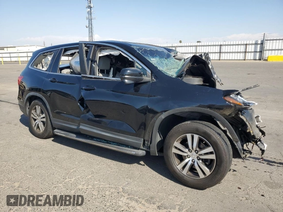 2016 Honda Pilot EX-L with VIN 5FNYF5H79GB043134, listed as a Copart auction lot 75058574 with Not Provided miles and Salvage Title. Bid and sale history available at DreamBid. Image 4.