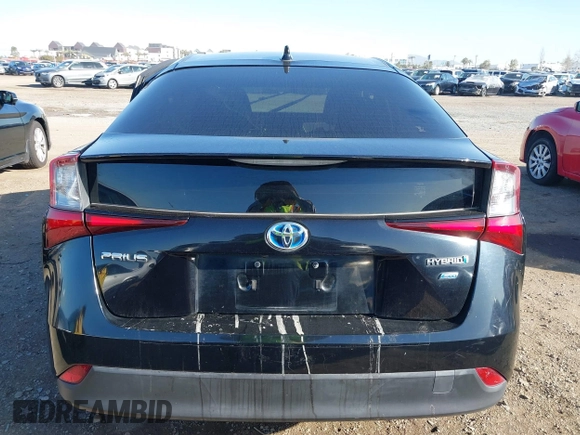 2021 Toyota Prius L Eco z VIN JTDKAMFU1M3134107, wystawiony jako IAAI lot #41763080 z przebiegiem 185 248 mil mil oraz . Historia ofert i sprzedaży dostępna na DreamBid. Obrazek 17.