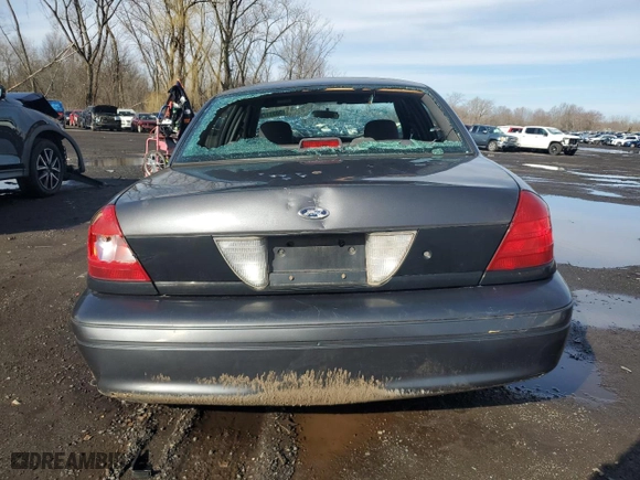 2004 Ford Police Interceptor Base w/3.27 Axle with VIN 2FAFP71W54X126756, listed as a Copart auction lot 50311705 with 135,654 mi miles and Salvage Title. Bid and sale history available at carsss.com. Image 6.