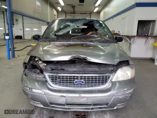 2003 Ford Windstar Wagon SE with VIN 2FMZA52403BB67426, listed as a Copart auction lot 77018904 with 0 mi miles and Salvage Title. Bid and sale history available at carsss.com. Image 5.