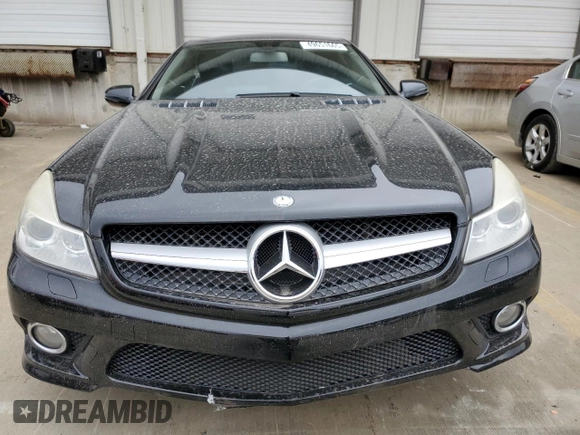 2009 Mercedes-Benz SL 550 with VIN WDBSK71F09F143389, listed as a Copart auction lot 49651665 with 110,204 mi miles and Salvage title. Bid and sale history available at DreamBid. Image 5.