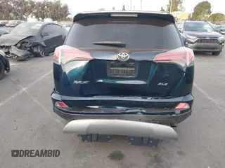 2018 Toyota RAV4 XLE with VIN JTMWFREV2JJ151595, listed as a IAAI auction lot 41380691 with 79,515 mi miles and . Bid and sale history available at carsss.com. Image 16.